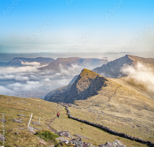 фотографія Landscape with hiker in Brandon mountains in spring
