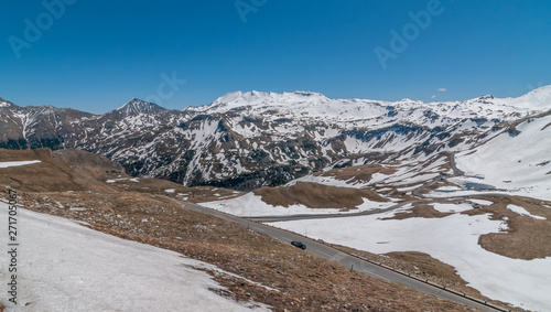 Beautiful snowy mountain scenery along the high alpine Grossglockner road with clear sky day, Austria.