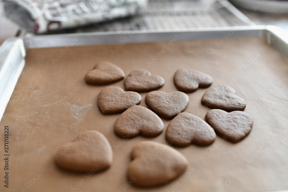 chocolate cookies in the form of heart, top view, pastry on the stove, dough preparation chocolate cookies in the form of heart, top view, pastry on the stove, dough preparation