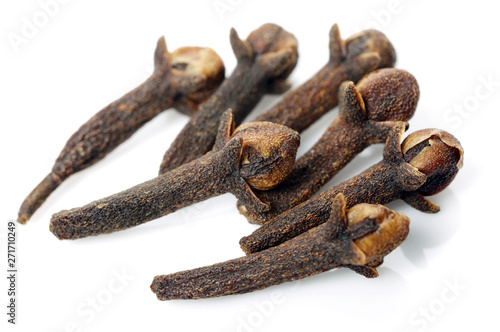 dry cloves on white background