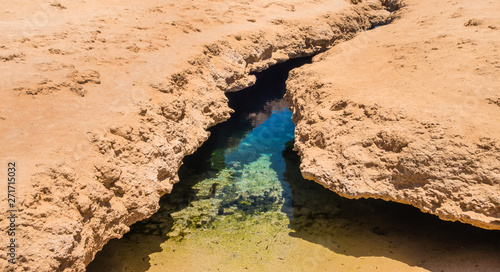 Desert earth crack red sea bay.