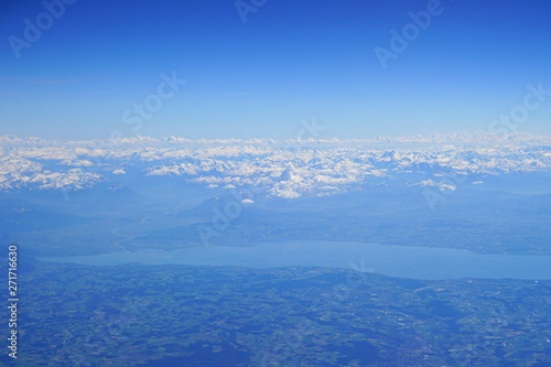 Aerial view of the Alps Mountains covered with snow over France and Switzerland