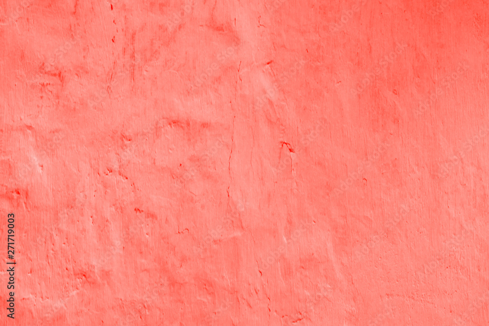 Living Coral color of the Year 2019 abstract background. plastered wall with decorative plaster main trend of the season