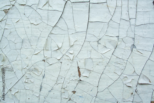white cracked paint texture. Old aged surface background © Quils