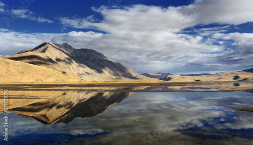 Tso Moriri lake  dramatic sky with reflection in the water  Changtang  Ladakh  India