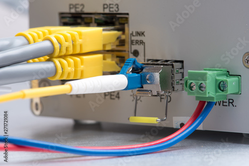Fiber optic and network ethernet patch cord cable connect to the switch
