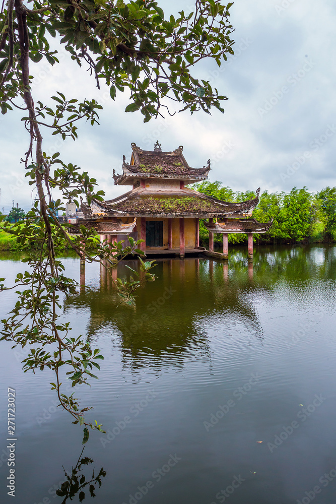 Nam Dinh , Vietnam - May 30, 2019 : Water puppetry palace on the water surface. - Image