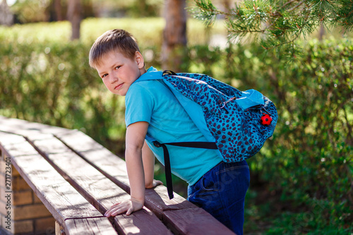 Eight-year-old boy with a backpack