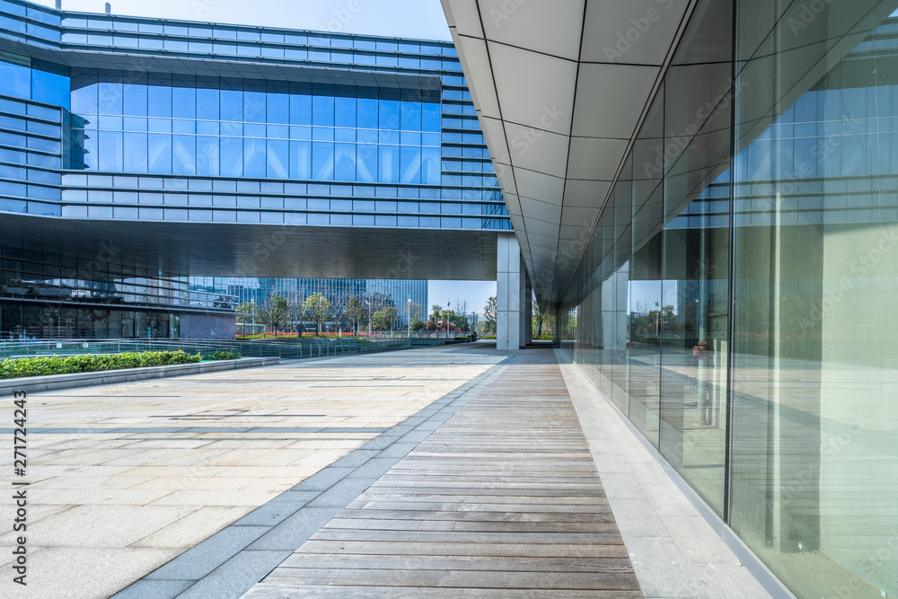 modern buildings and empty pavement in china. modern buildings and empty pavement in china.