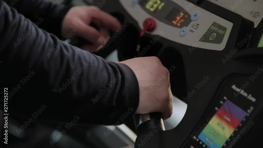 Adult overweight man on the treadmill at the gym. Adult overweight man on the treadmill at the gym.