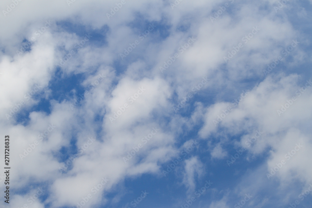 Beautiful sky texture view of white clouds in the blue sky.