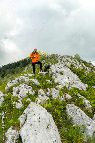 Female hiker on a rocky mountain