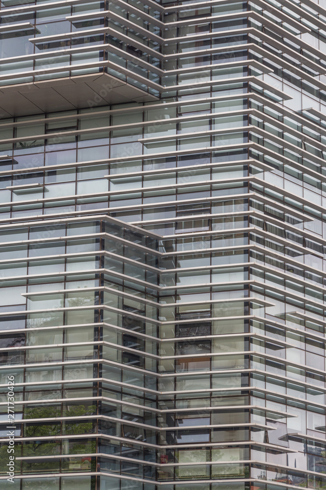 Glass facade structure of modern urban financial and commercial office buildings Glass facade structure of modern urban financial and commercial office buildings