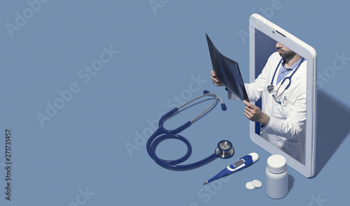 Professional doctor giving a consultation online photo