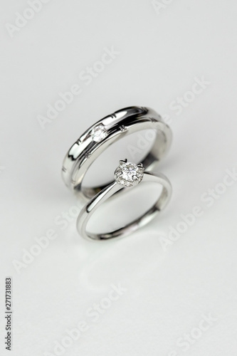 Couple diamond rings on white isolated