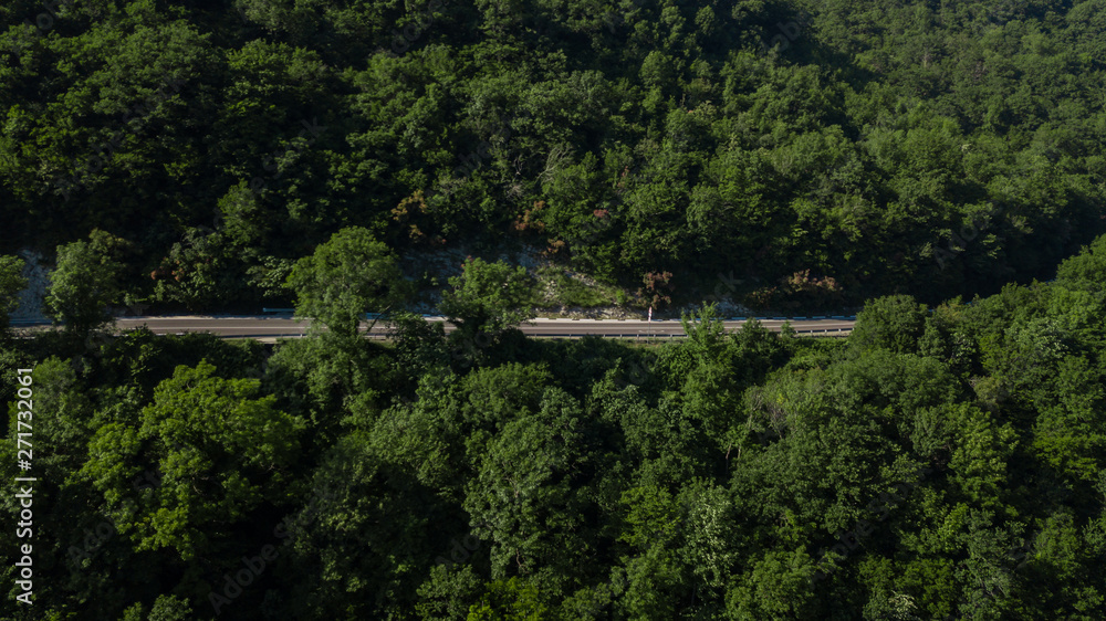 Curved asphalt highway road in mountains of South Russia Curved asphalt highway road in mountains of South Russia