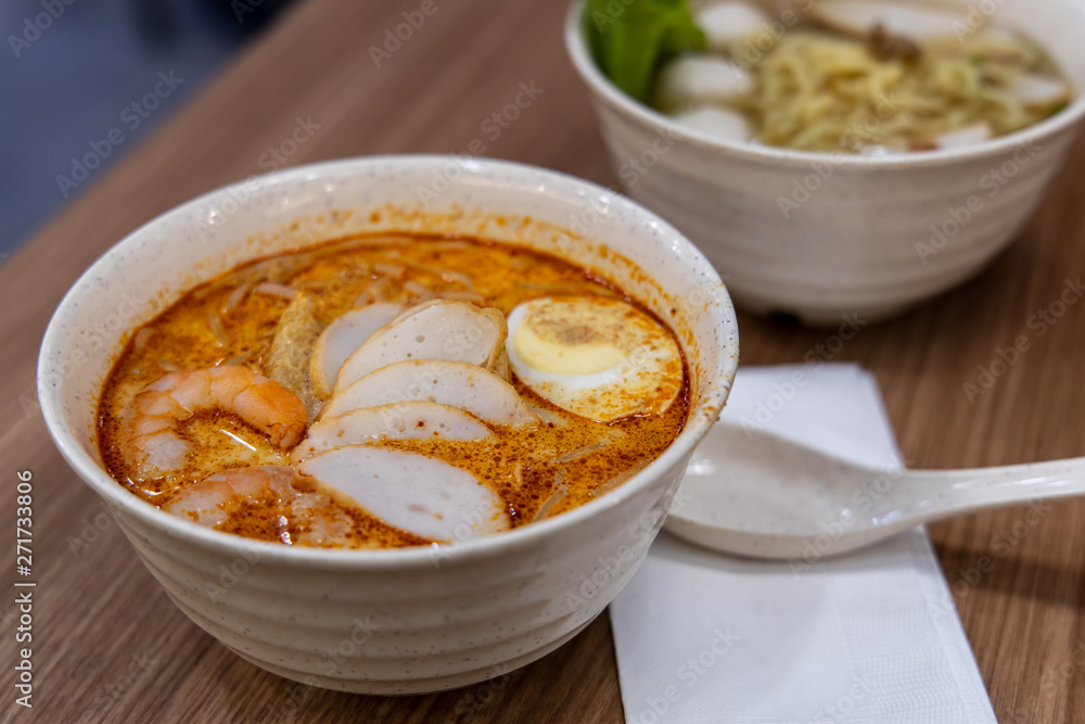 Laksa is a spicy noodle soup popular in Peranakan cuisine of Southeast Asia Laksa is a spicy noodle soup popular in Peranakan cuisine of Southeast Asia