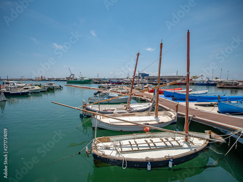 Cambrils pier that ends in the Mediterranean Sea, in Spain photo