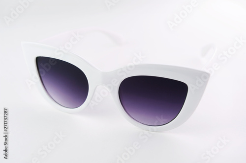 Sunglasses retro sunglasses in white rim on a white background.