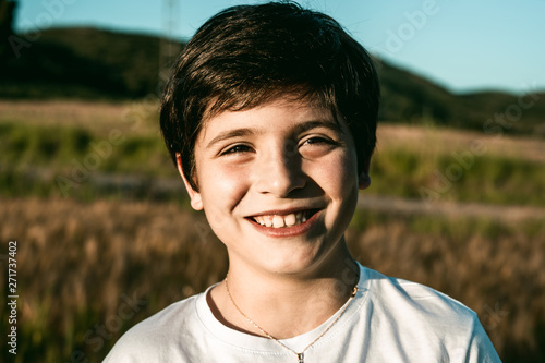 Portrait of a little child smiling and with funny expression