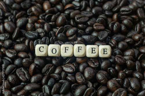  coffee roasted and text wood cube close up image.