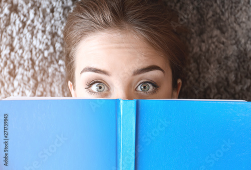 Surprised young woman with ...