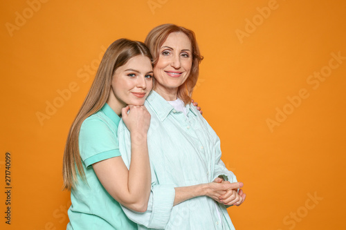 Portrait of happy mother wi...