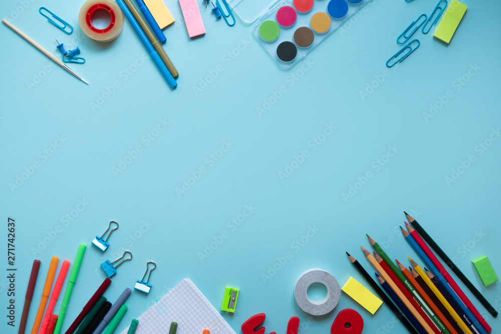 School elements on blue background with space for text symbolizing back to school School elements on blue background with space for text symbolizing back to school