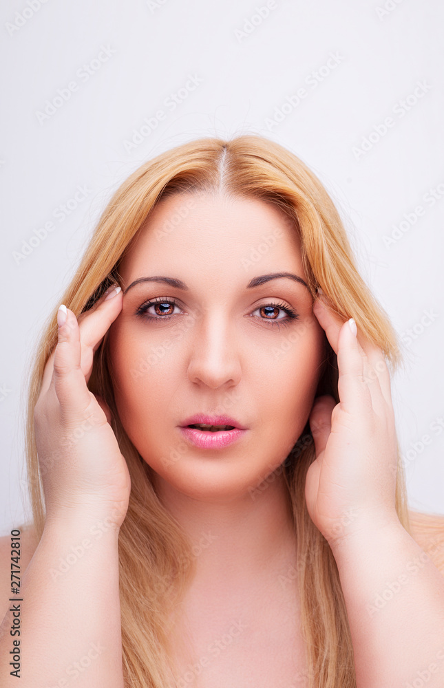 A portrait of beautiful face with beautiful brown eyes - isolated on white. A portrait of beautiful face with beautiful brown eyes - isolated on white.