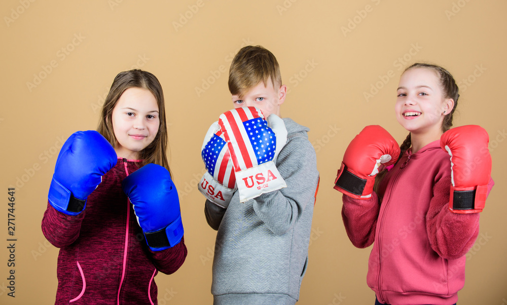 Friendly sparring. Boy and girls friends wear boxing gloves with usa flag.  American sport concept. Children sporty practicing boxing skills. Boxing  sport. Start boxing career. Self defence skills Stock Photo | Adobe