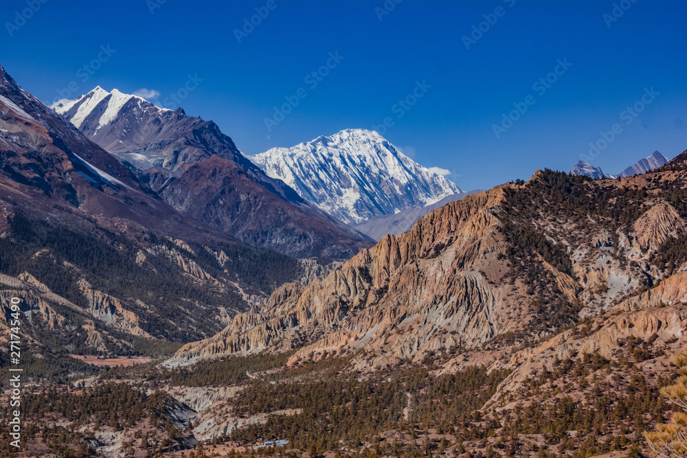 View of the majestic autumn mountains of Nepal from trekking around Annapurna
