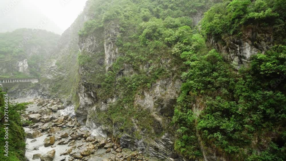 Taroko Gorge National Park in Taiwan. Beautiful Rocky Marble Canyon with Dangerous Cliffs and River Taroko Gorge National Park in Taiwan. Beautiful Rocky Marble Canyon with Dangerous Cliffs and River