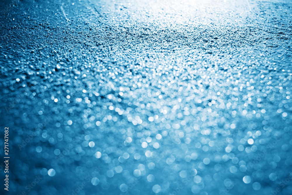 Obraz premium Blue color glitter background with bokeh defocused
