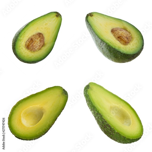 set of halves of avocado isolated on white background