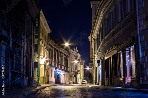 Narrow street in the Old Town of Vilnius at night. Lithuania