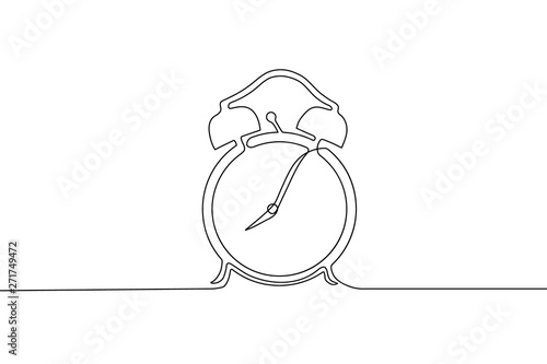 Single circle vintage alarm clock with arrows and balls drawn in continuous one line style isolated on white background. Self drawing photo