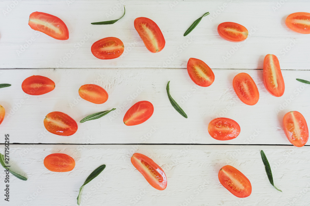 Rosemary tomatoes are placed on a white table. Rosemary tomatoes are placed on a white table.