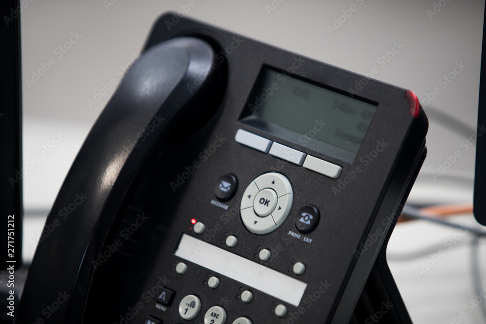 close up soft focus on telephone devices at office desk. close up soft focus on telephone devices at office desk.