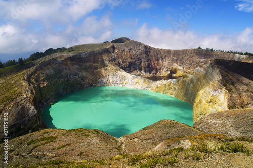 KELIMUTU VOLCANO WITH BLUE AND BROWN WATER IN FLORES ISLAND-INDONESIA 
