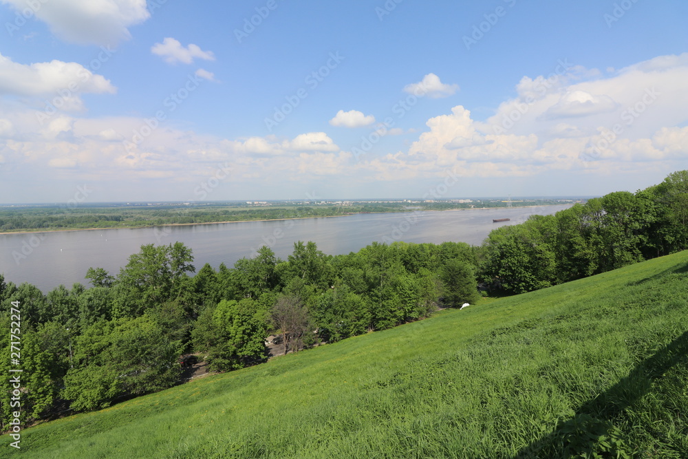 summer landscape with river and clouds summer date in a Sunny city on a warm day