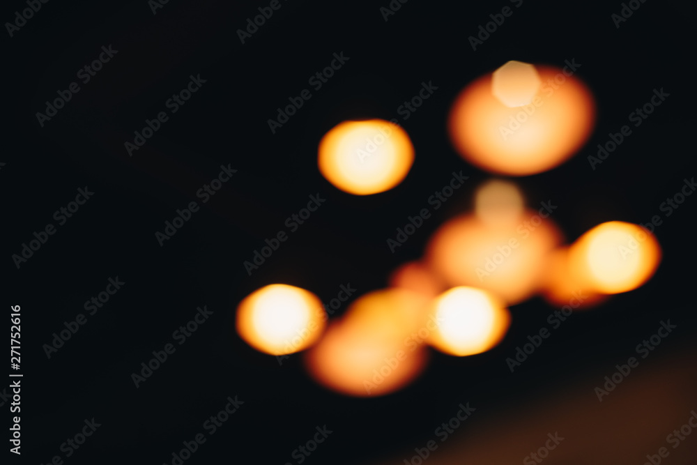 Blurred images of lamps in restaurants
