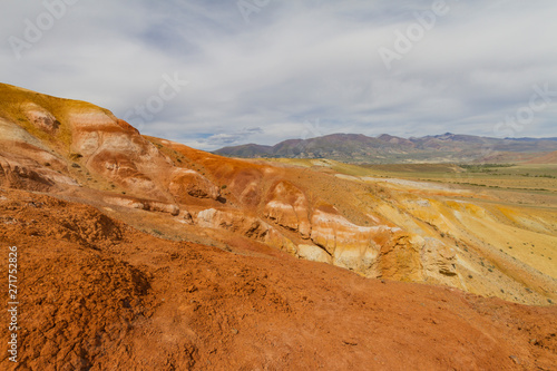 Red mountains in Kyzyl-Chin valley in Altay. Scenic landscape. Summer concept.