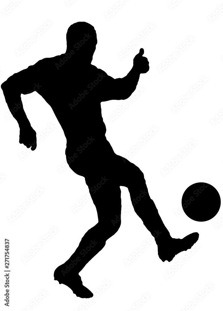 Soccer player as silhouette isolated while shooting a football Soccer player as silhouette isolated while shooting a football