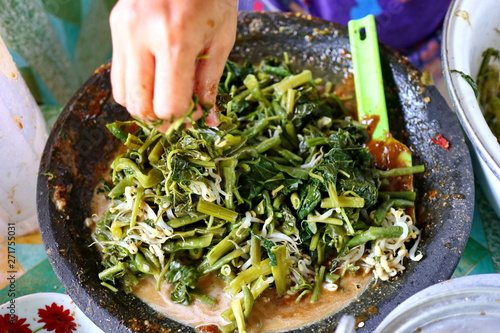 the process of making vegetable pecel photo