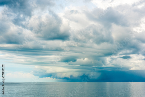 Interesting storm clouds over horizon tropical Australia ocean