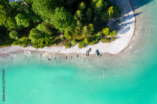 Türkises Wasser. Walchensee. Strand mit Booten und Wald. Bayern Deutschland. Luftbild photo