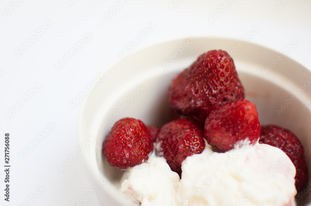 strawberries with ice cream in sundae strawberries with ice cream in sundae