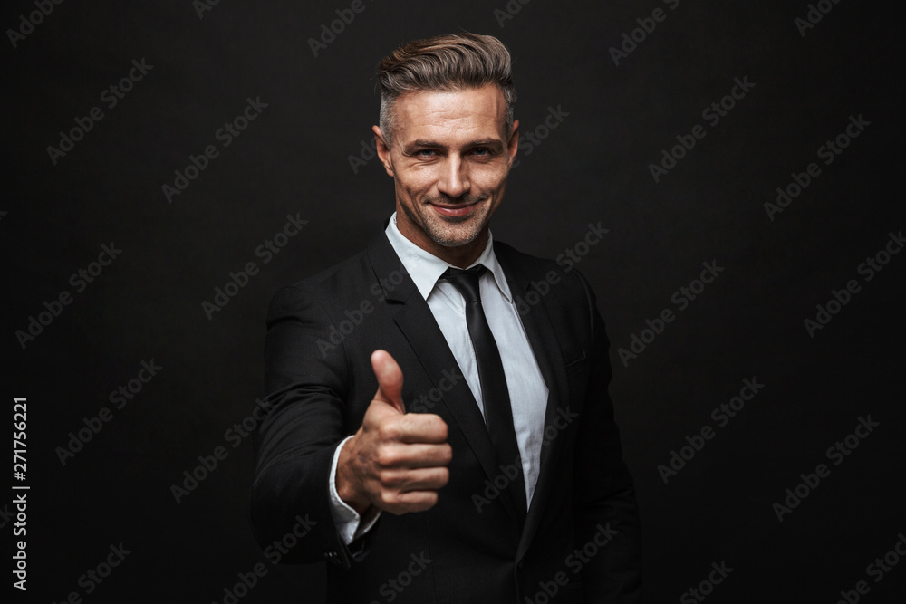 Handsome confident businessman wearing suit Handsome confident businessman wearing suit