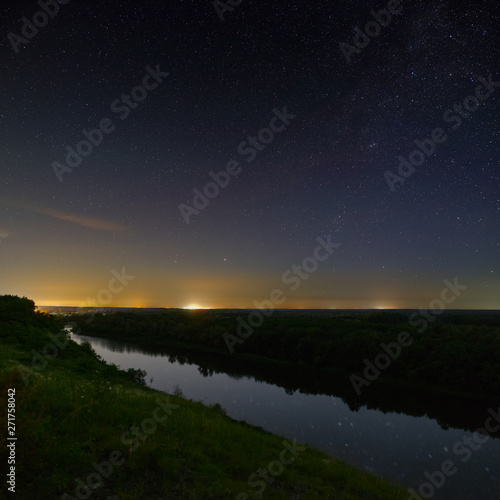 View of the Milky Way over the river