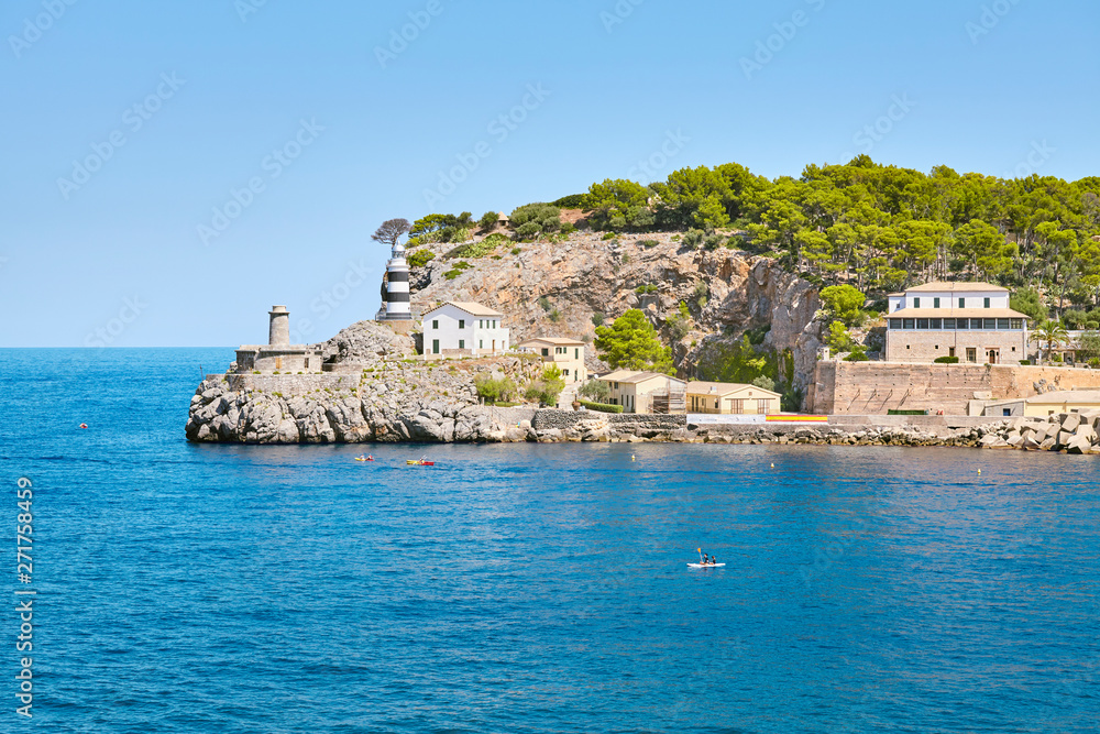Lighthouse in Port de Soller, picturesque little village located at the foot of the Serra de Tramuntana, Majorca, Spain.